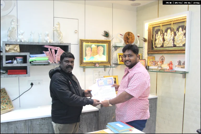Property registration document handover between Anayaa Greenland team and happy plot buyers in office
